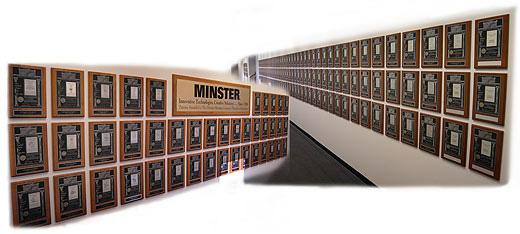 Nidec Minster の特許証を飾った壁