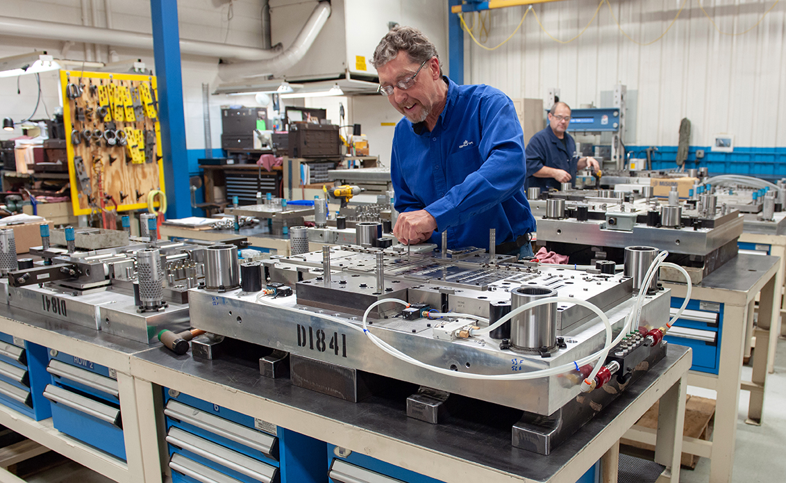 Employee working on tooling